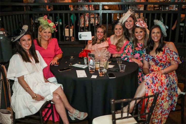 DerbyBash Smiling women at Derby bash banquet table